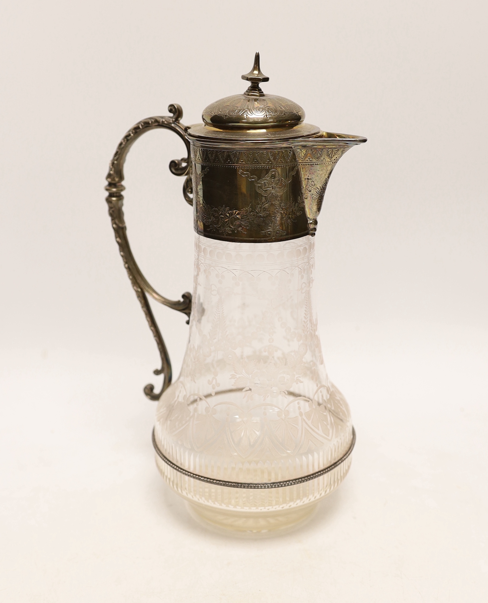 A late Victorian silver mounted etched glass decanted by The Barnards, London, 1876, height 28.3cm.